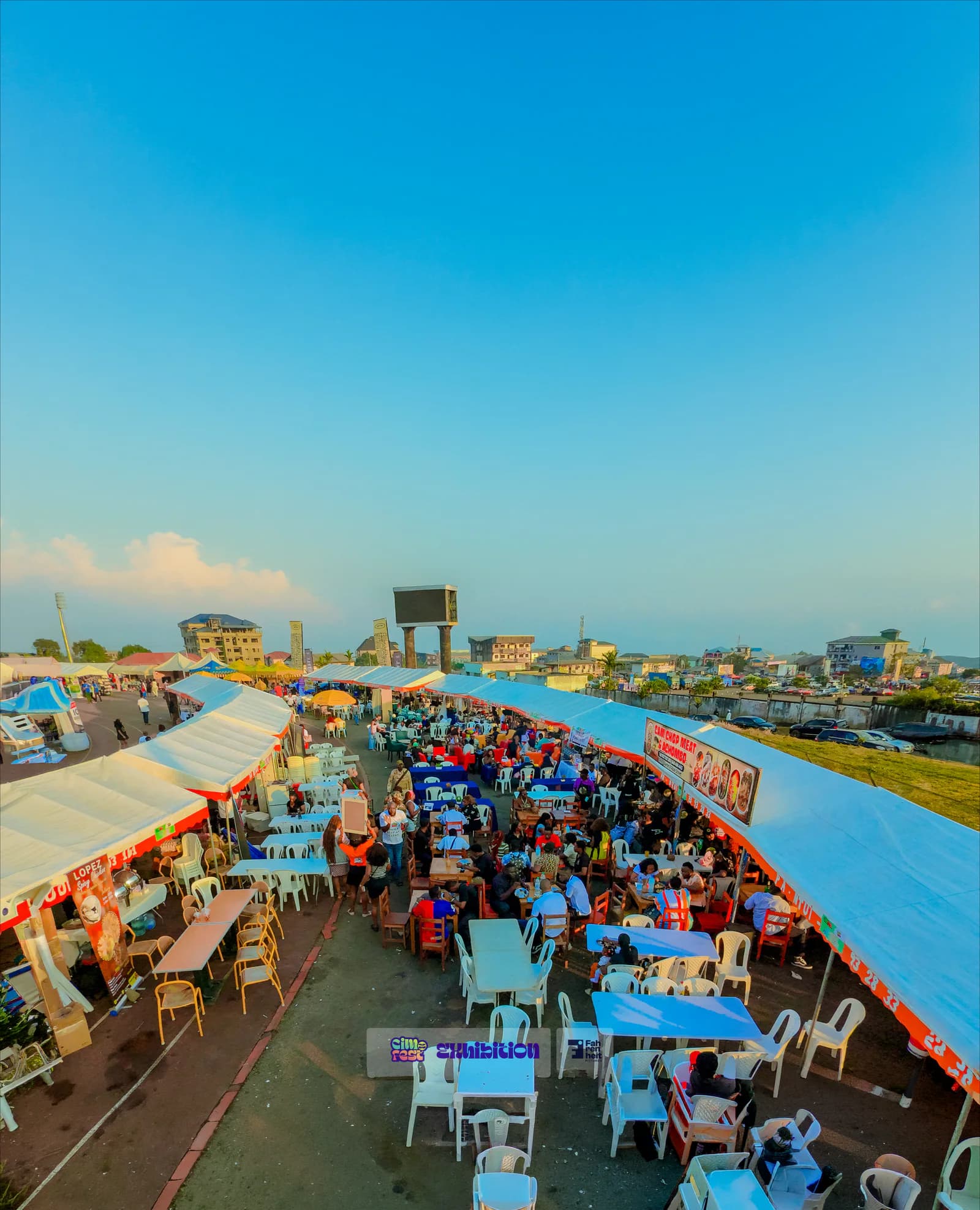 Festival guests exploring an exhibition area